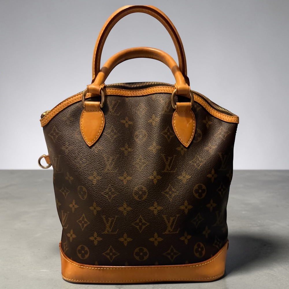 Louis Vuitton Lockit PM Handbag (LV100)